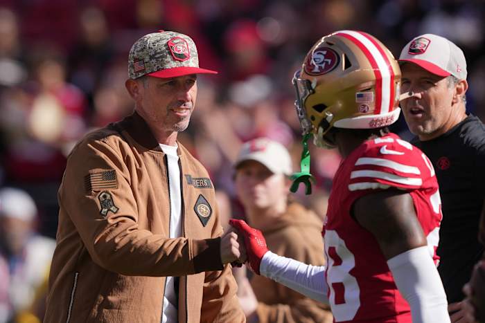 Nov 19, 2023; Santa Clara, California, USA; San Francisco 49ers head coach Kyle Shanahan (left) greets cornerback Darrell Luter Jr. (right) before the game against the Tampa Bay Buccaneers at Levi's Stadium.
